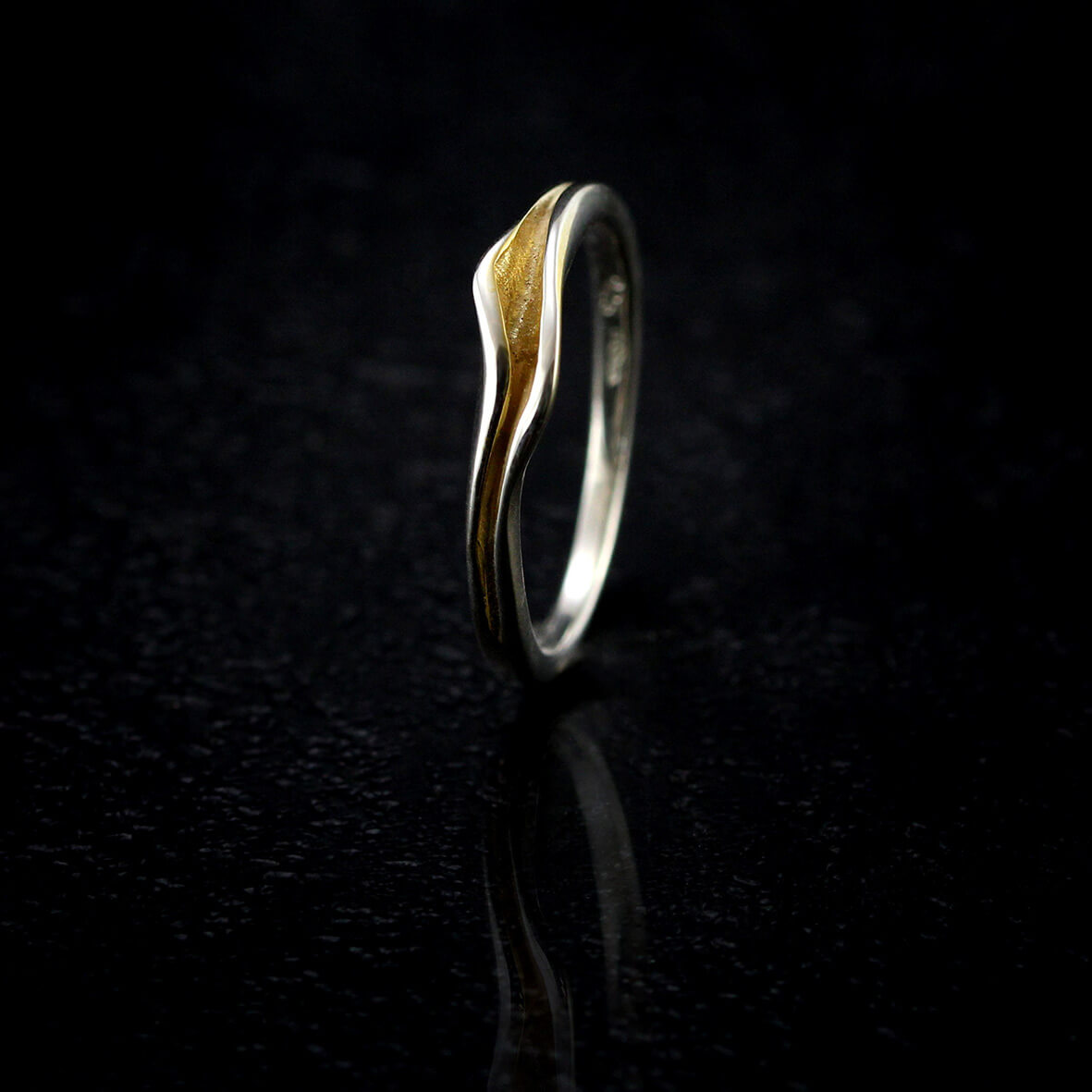 silver gold ring: - Simple but unique with a glow from within