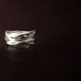 Silver ring: -  made of twisted silver roots